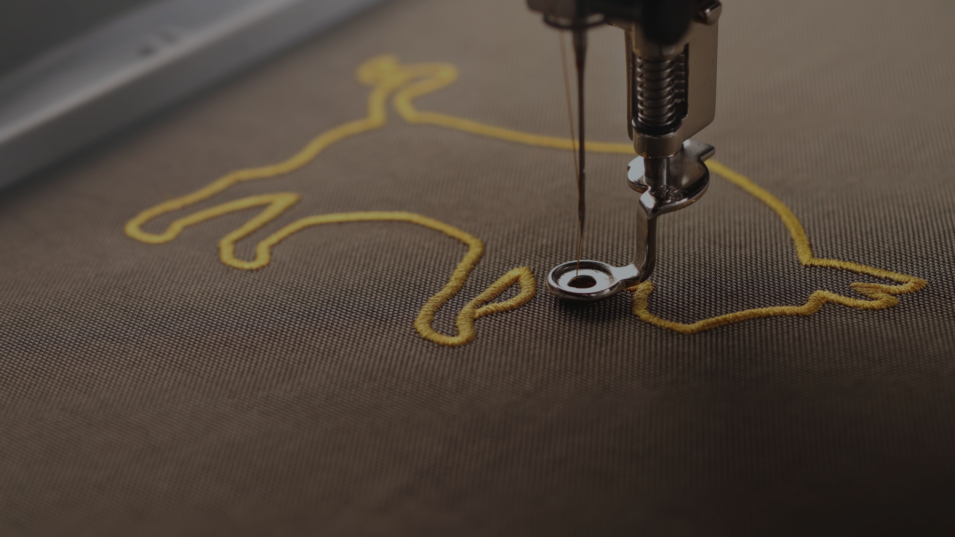 Textilveredelung Eschweiler – hochwertige Bestickung eines Logos
